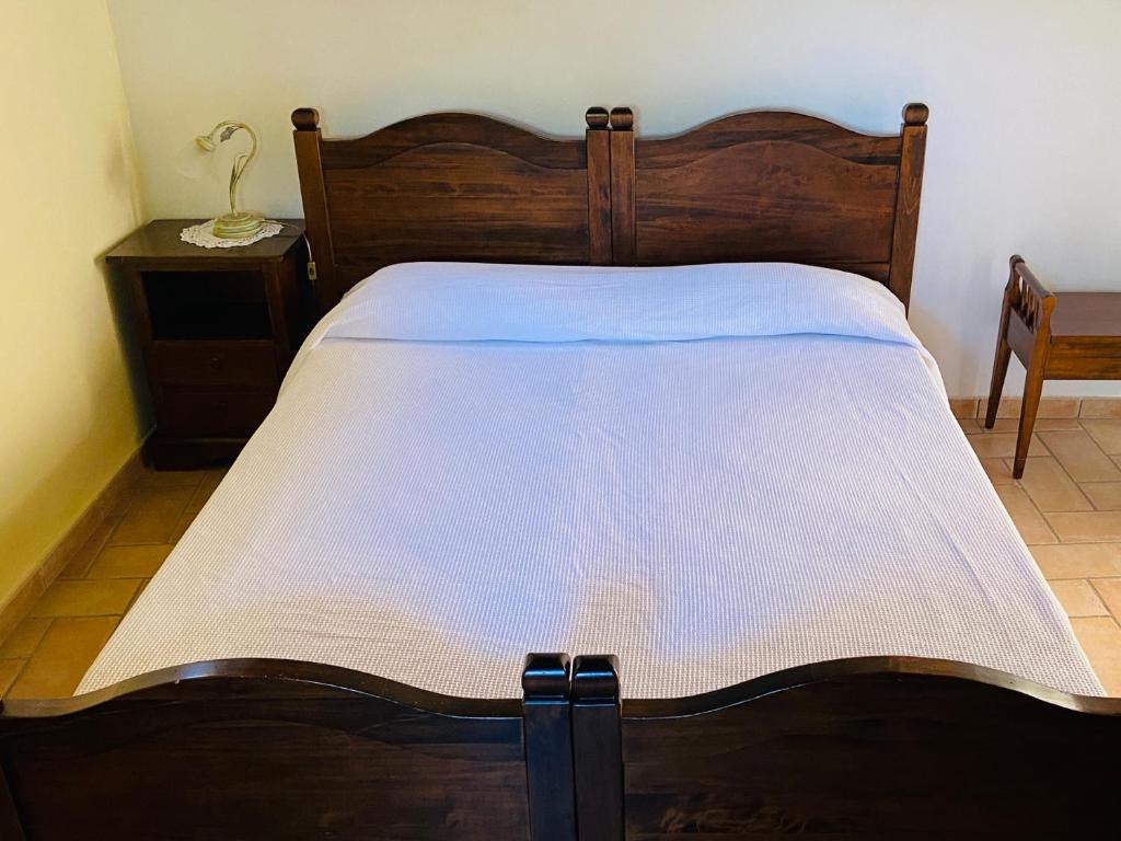 Postel nebo postele na pokoji v ubytování Locanda Cacio Re