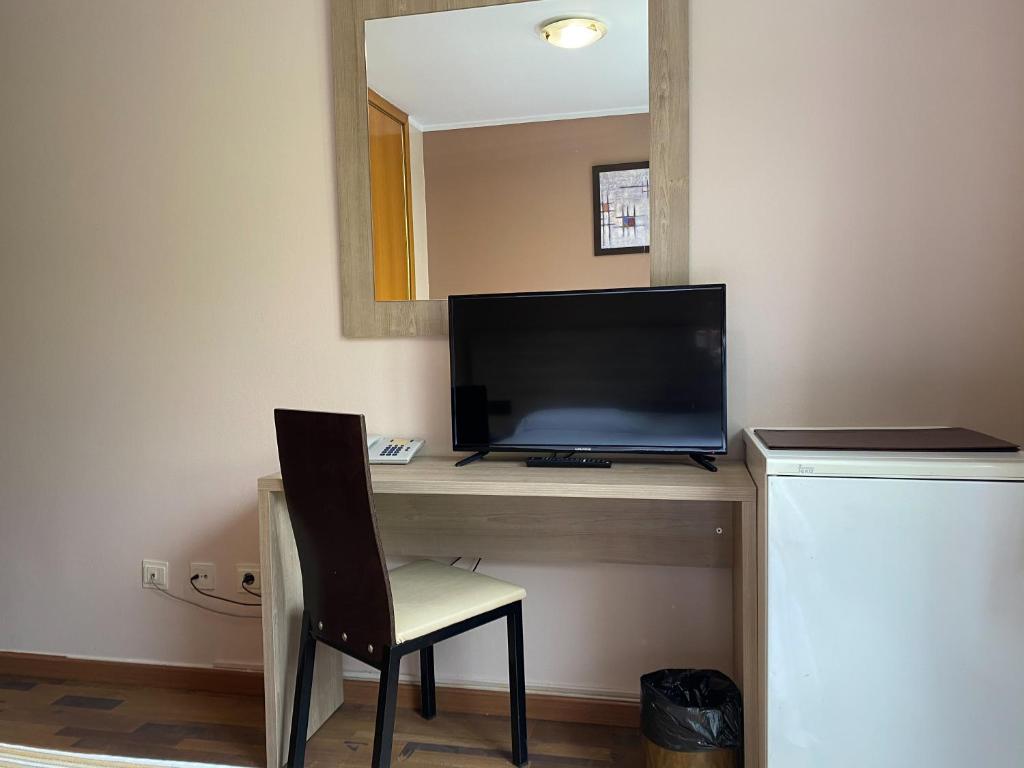 TV a/nebo společenská místnost v ubytování Somriu Hotel Vall Ski