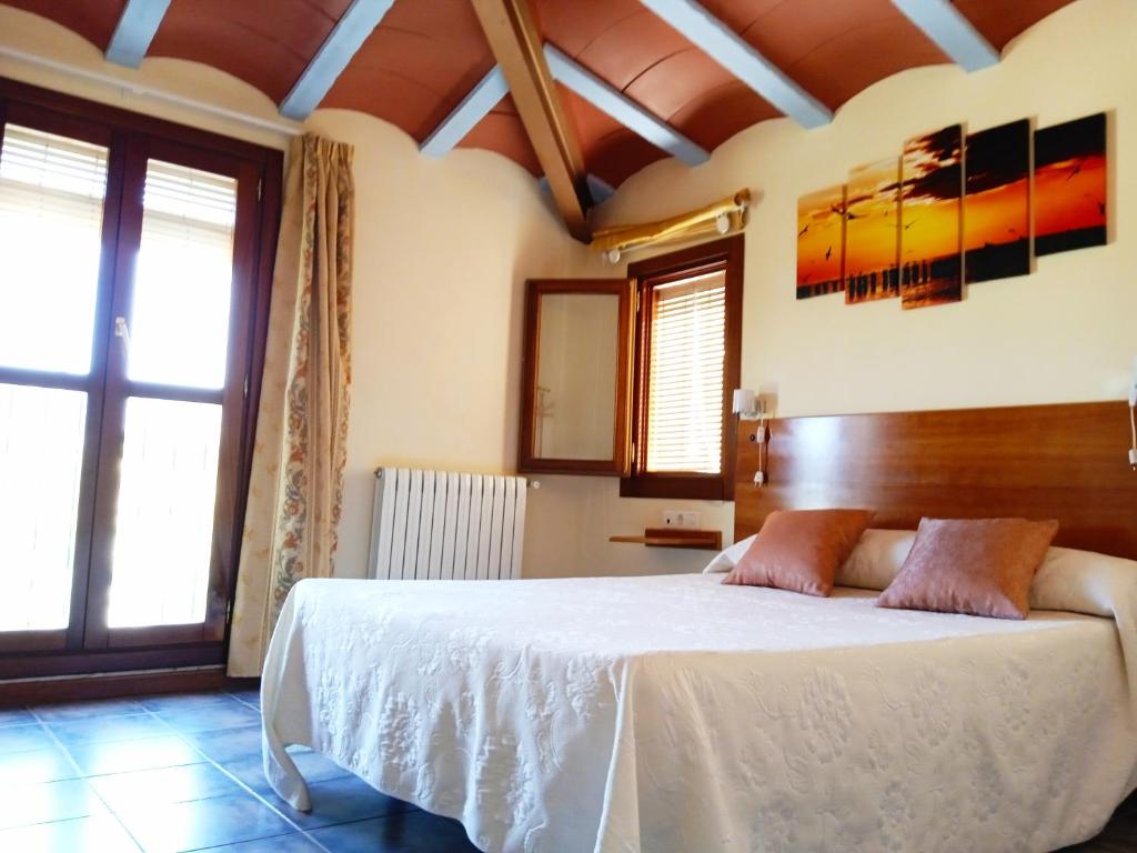 Postel nebo postele na pokoji v ubytování Hotel El Zorro