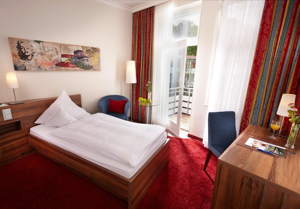 Postel nebo postele na pokoji v ubytování Hotel Noltmann-Peters