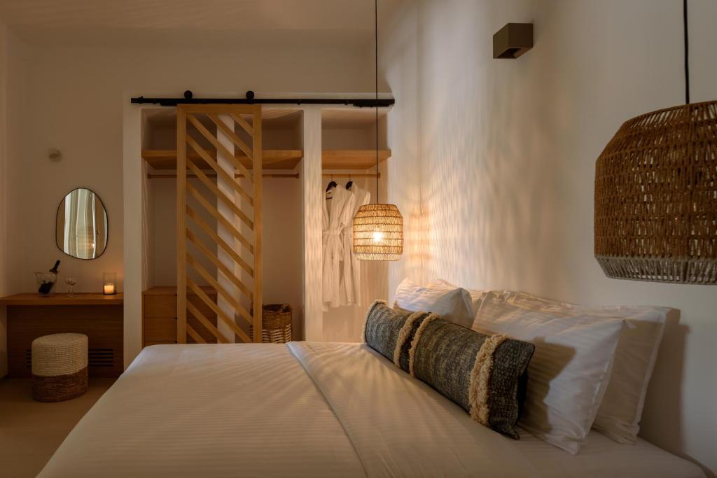 Łóżko lub łóżka w pokoju w obiekcie Este Luxury Suites