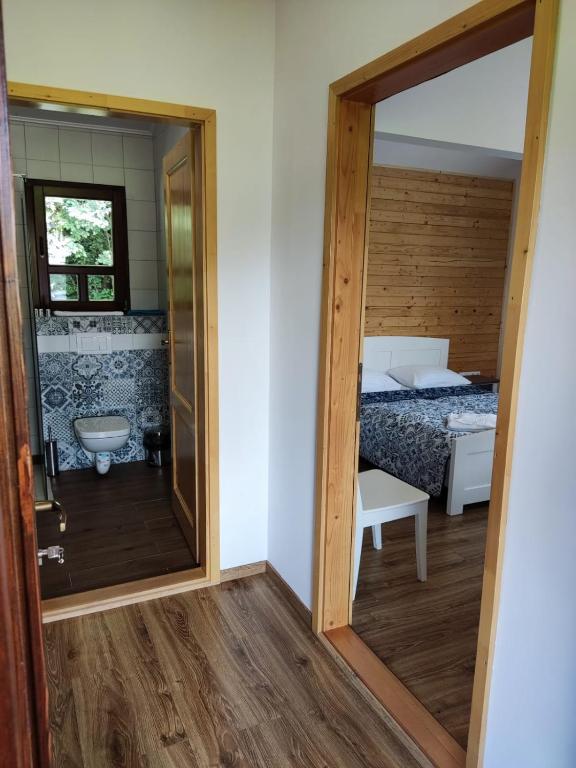 Postel nebo postele na pokoji v ubytování Hygge Praid