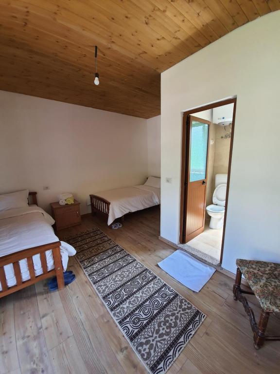 Letto o letti in una camera di Guest House Flodisa