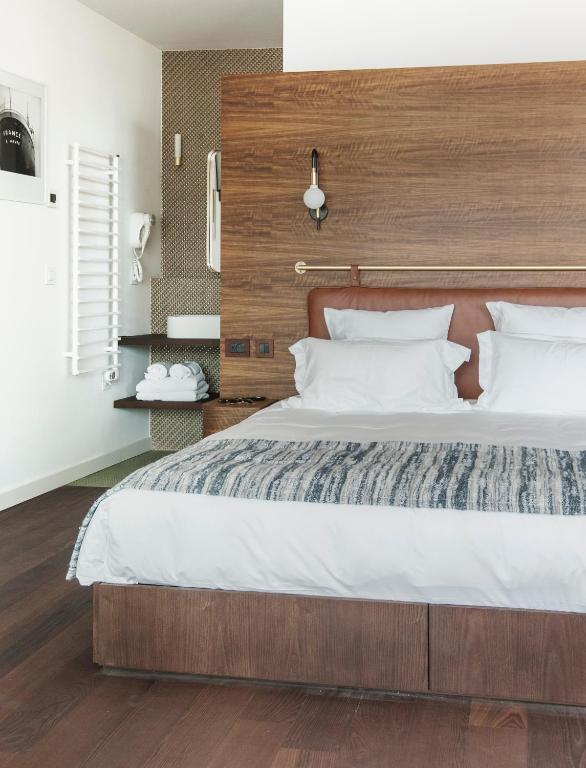 Postel nebo postele na pokoji v ubytování Boutique Hotel Miramar