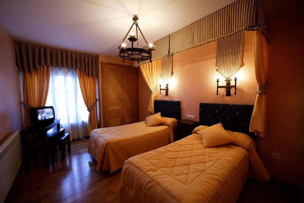 Postel nebo postele na pokoji v ubytování Posada Real La Yensula