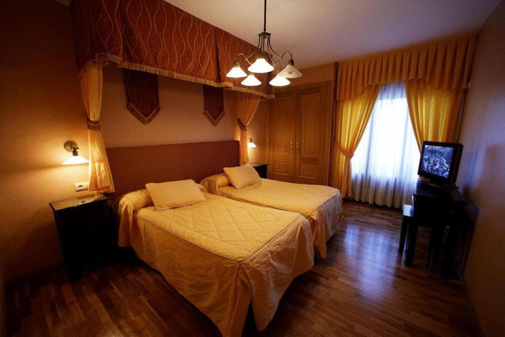 Postel nebo postele na pokoji v ubytování Posada Real La Yensula