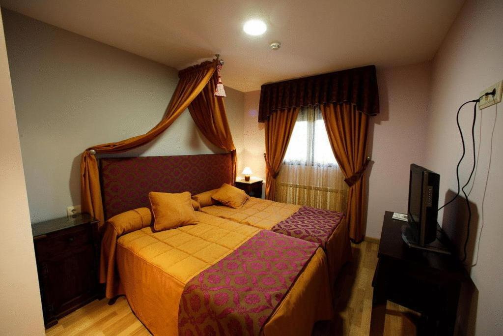 Postel nebo postele na pokoji v ubytování Posada Real La Yensula