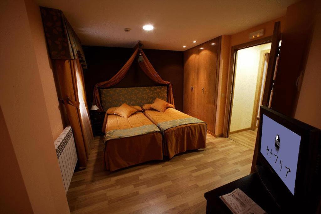 Postel nebo postele na pokoji v ubytování Posada Real La Yensula