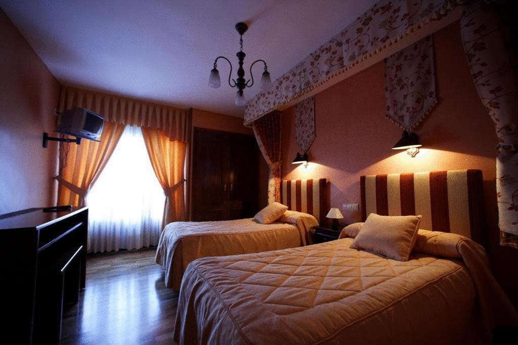 Postel nebo postele na pokoji v ubytování Posada Real La Yensula