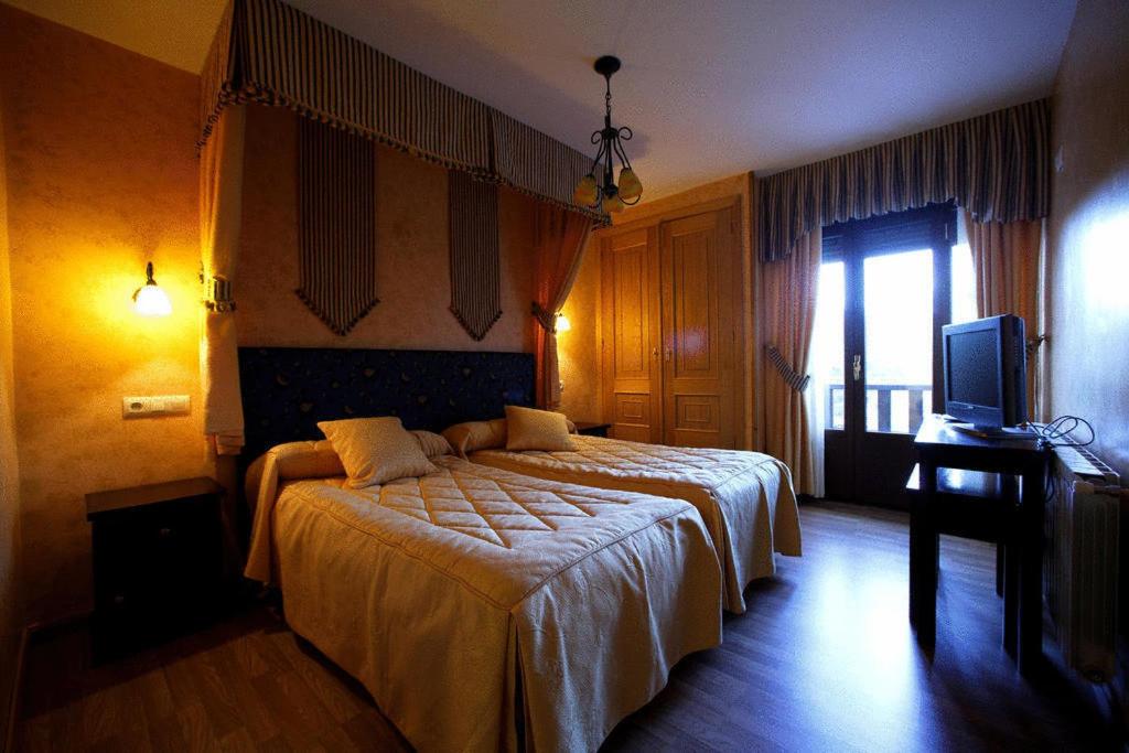 Postel nebo postele na pokoji v ubytování Posada Real La Yensula