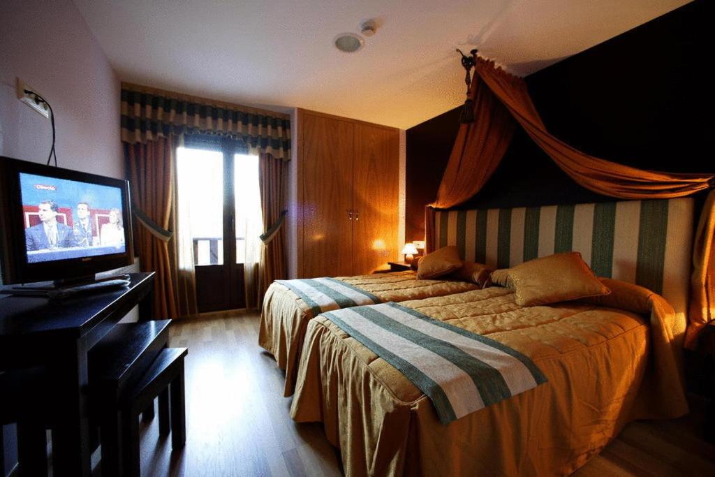 Postel nebo postele na pokoji v ubytování Posada Real La Yensula