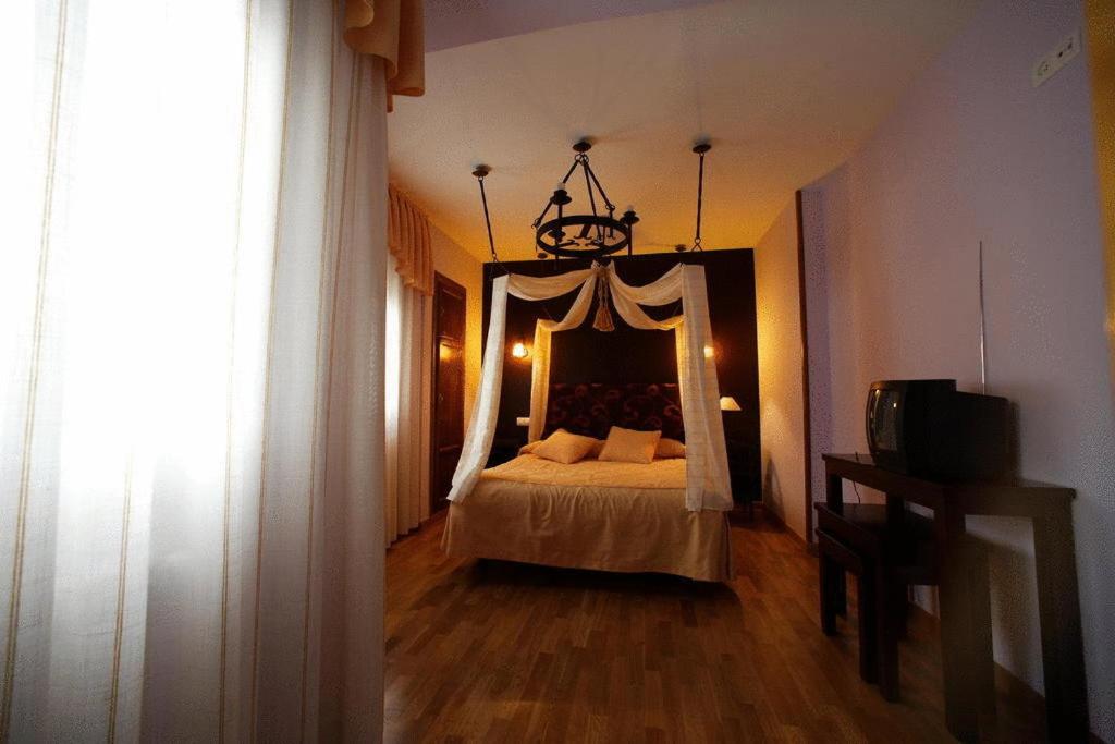 Postel nebo postele na pokoji v ubytování Posada Real La Yensula