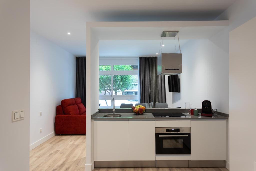 A kitchen or kitchenette at APARTAMENTOS ARRIET
