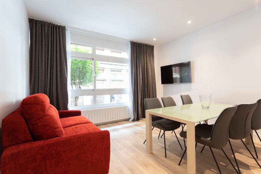 A television and/or entertainment centre at APARTAMENTOS ARRIET