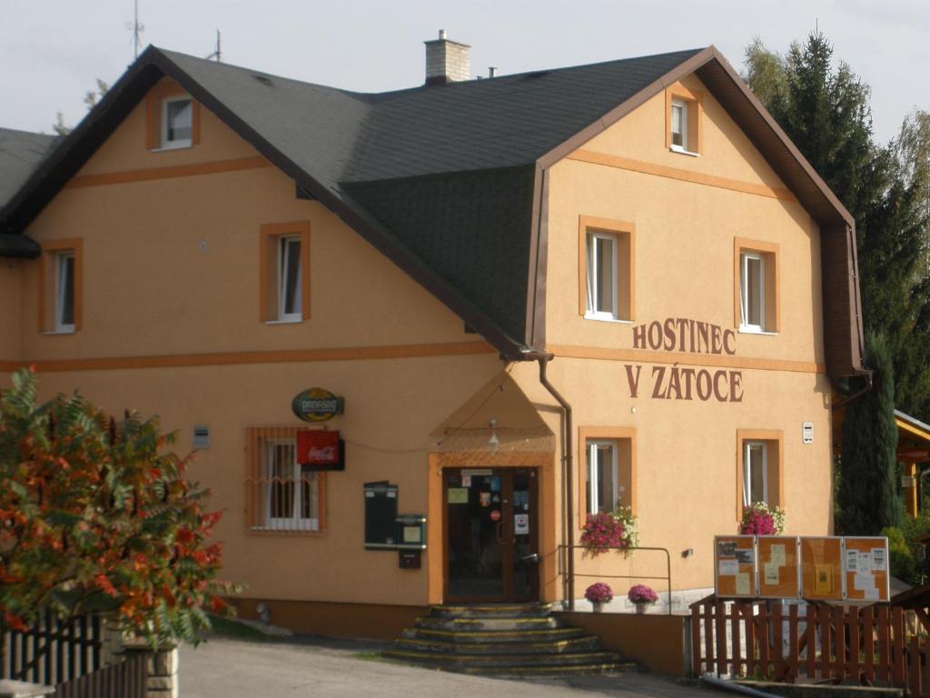 a building with a black roof at Hostinec v Zátoce in Horní Těrlicko