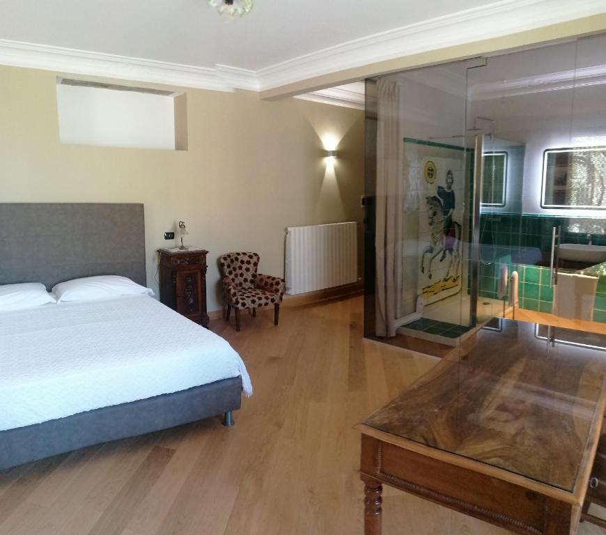 Postel nebo postele na pokoji v ubytování B&B Sciabakè