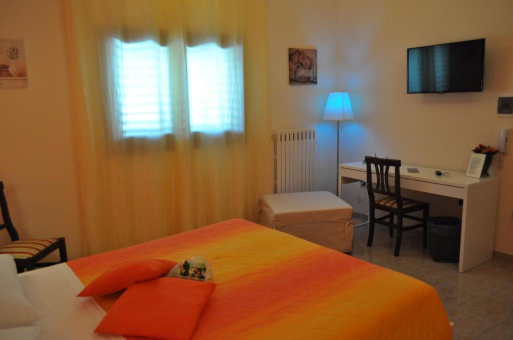 A bed or beds in a room at 7 Contrade