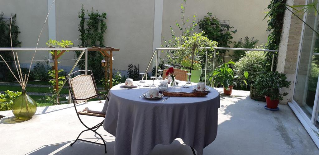 Balkón nebo terasa v ubytování le jardin des quatres saisons