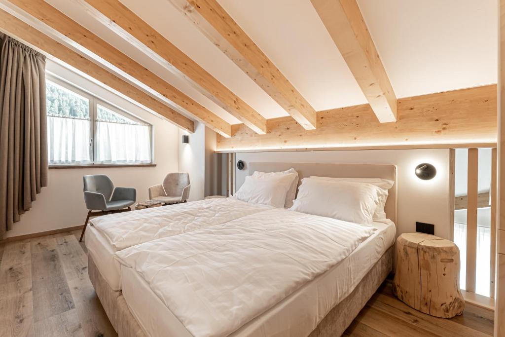 Postel nebo postele na pokoji v ubytování Àlia Bianca Active & Family Hotel