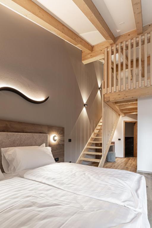 Postel nebo postele na pokoji v ubytování Àlia Bianca Active & Family Hotel