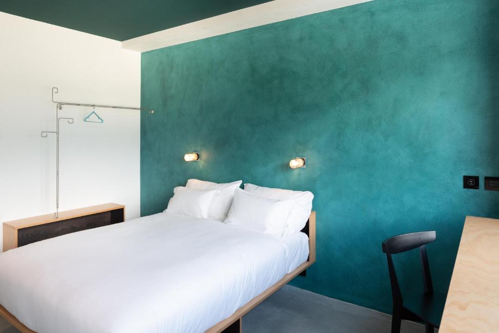 Postel nebo postele na pokoji v ubytování Riva Rooms & Studios - Check-In 24hr