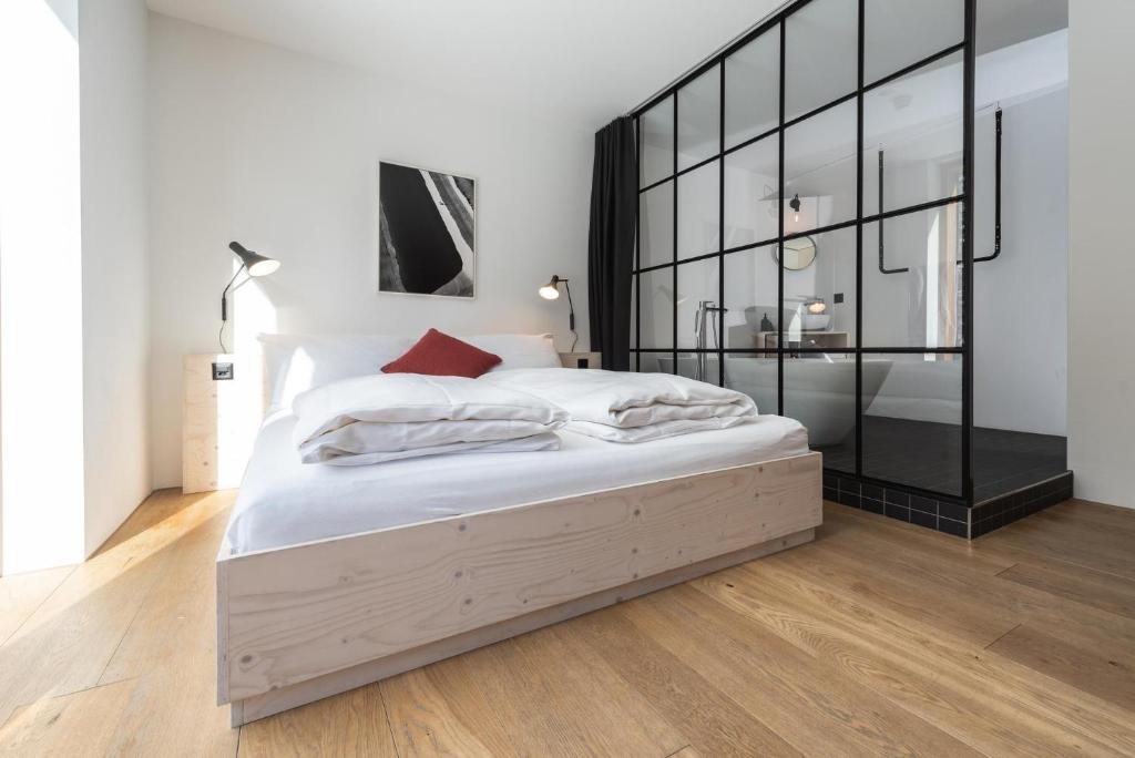 Postel nebo postele na pokoji v ubytování Riders Hotel