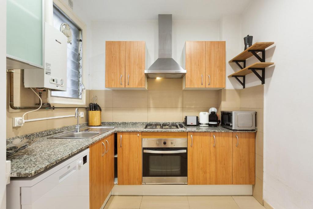 A kitchen or kitchenette at Stay U-nique Apartments Mistral