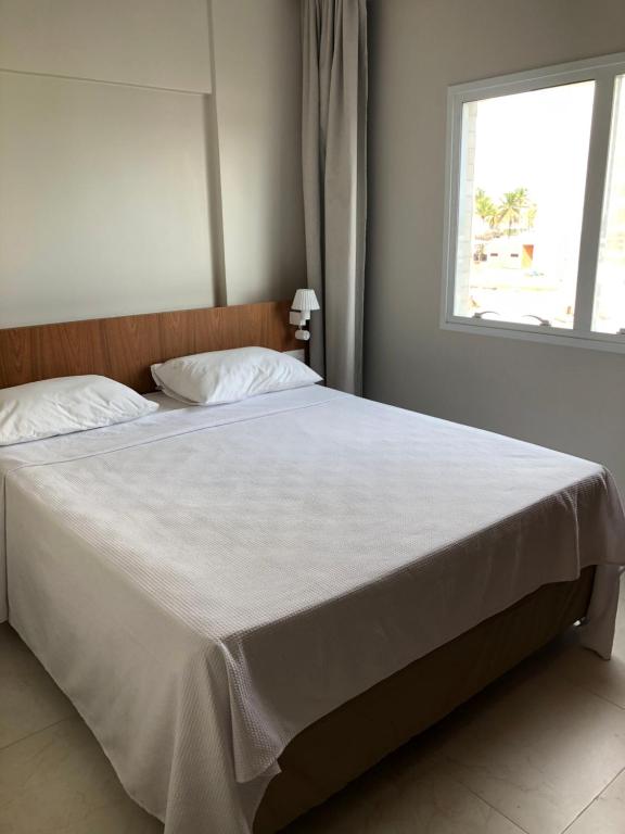Postel nebo postele na pokoji v ubytování SALINAS EXCLUSIVE RESORT