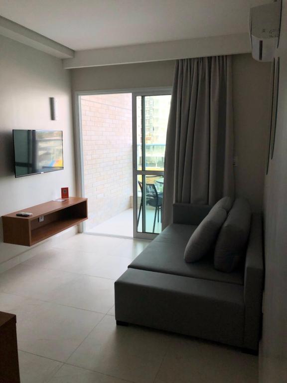 TV a/nebo společenská místnost v ubytování SALINAS EXCLUSIVE RESORT