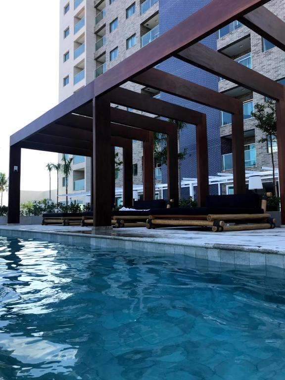Bazén v ubytování SALINAS EXCLUSIVE RESORT nebo v jeho okolí