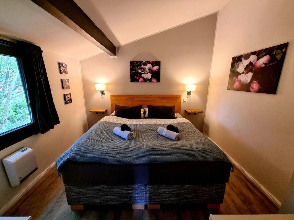 Postel nebo postele na pokoji v ubytování Ferienhaus Elbdiek
