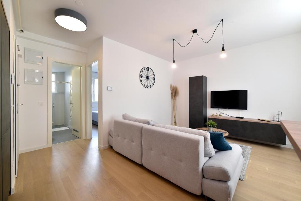 Telewizja i/lub zestaw kina domowego w obiekcie On Time Apartment