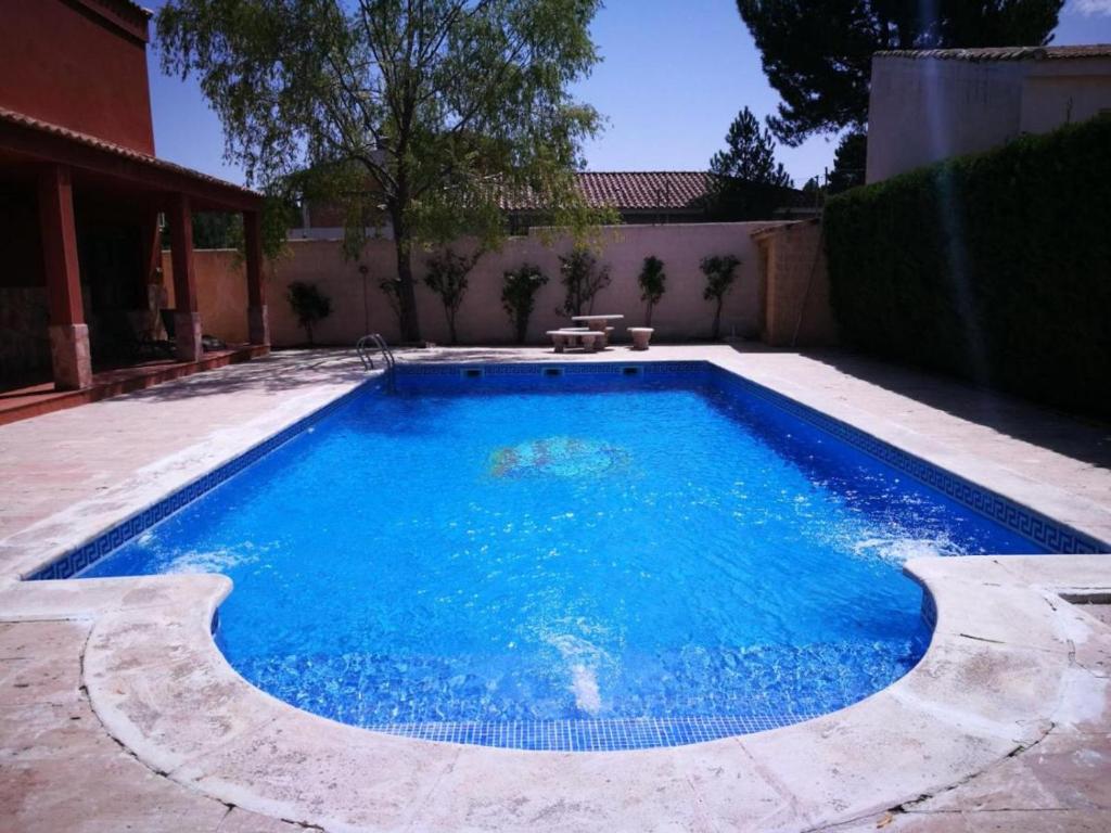 Swimming pool sa o malapit sa 4 bedrooms villa with private pool jacuzzi and wifi at Arcas