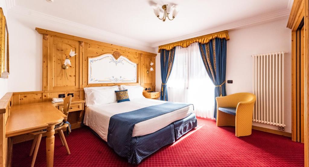 Postel nebo postele na pokoji v ubytování Hotel Antares