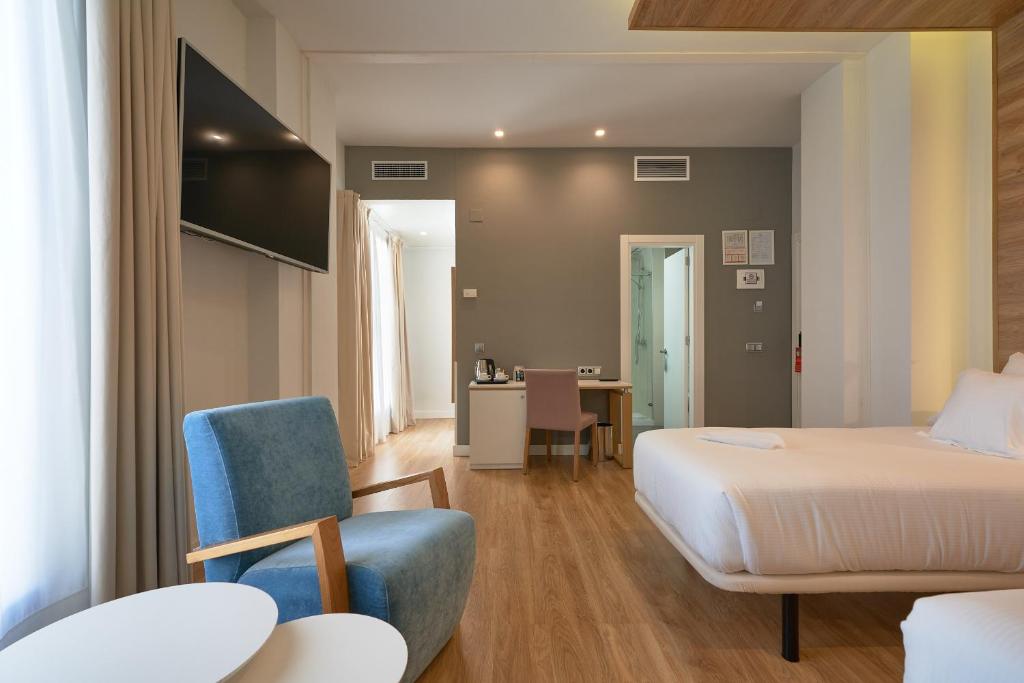 TV a/nebo společenská místnost v ubytování Hotel Monte Puertatierra