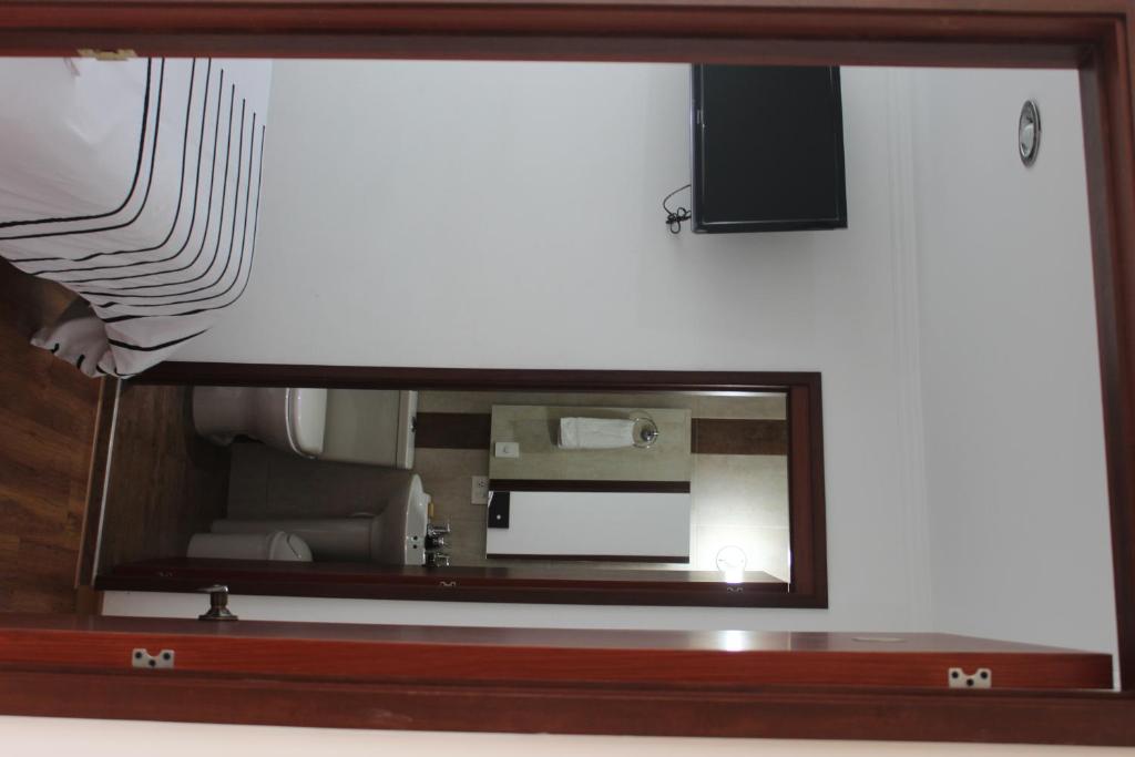 TV a/nebo společenská místnost v ubytování Hotel Real Estación