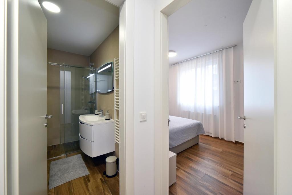 Łazienka w obiekcie On Time Apartment