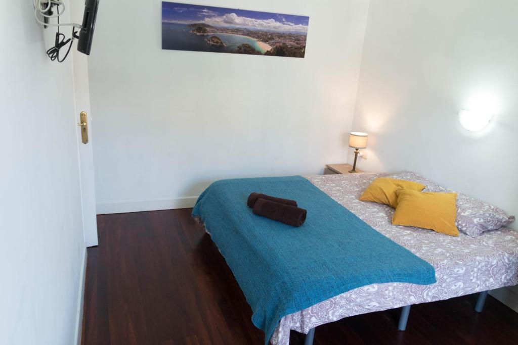 Posteľ alebo postele v izbe v ubytovaní La plaza apartment