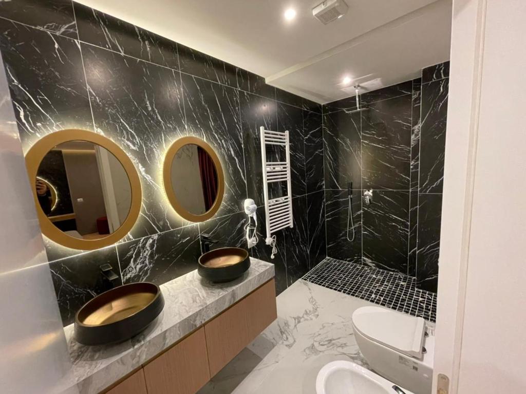 Koupelna v ubytování Hotel Colis