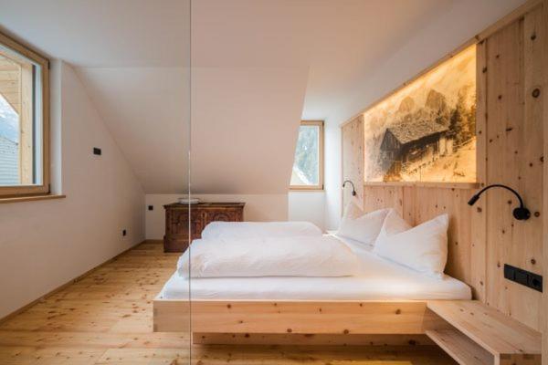 Postel nebo postele na pokoji v ubytování Ausserwegerhof