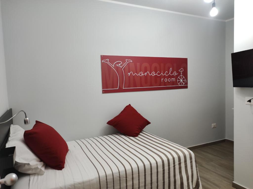 Łóżko lub łóżka w pokoju w obiekcie b&b La Bicicletta