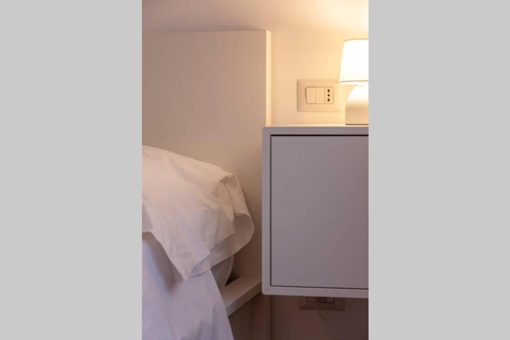 Posteľ alebo postele v izbe v ubytovaní Lazzi - A.C. - Wi-Fi - Flexyrent Apartment
