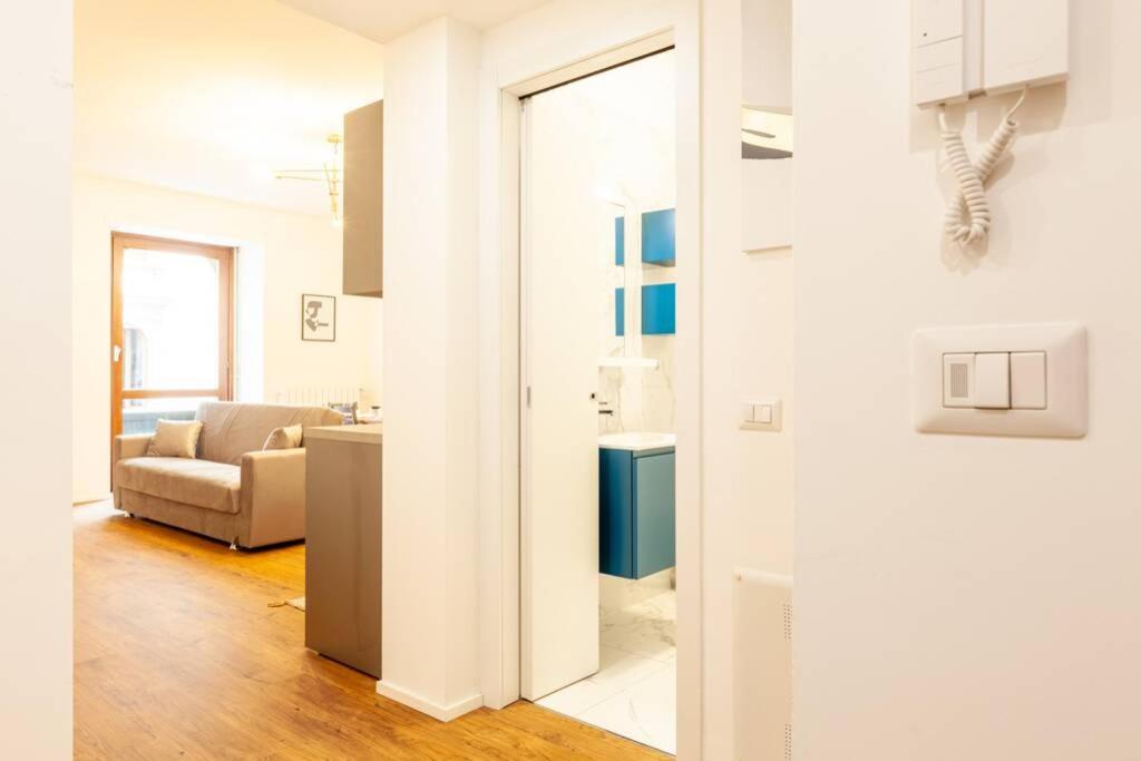 Posteľ alebo postele v izbe v ubytovaní Lazzi - A.C. - Wi-Fi - Flexyrent Apartment