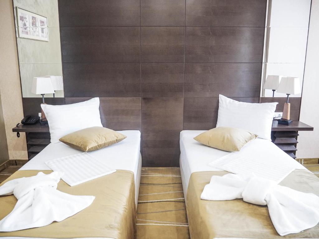 Postel nebo postele na pokoji v ubytování Hotel Nevada