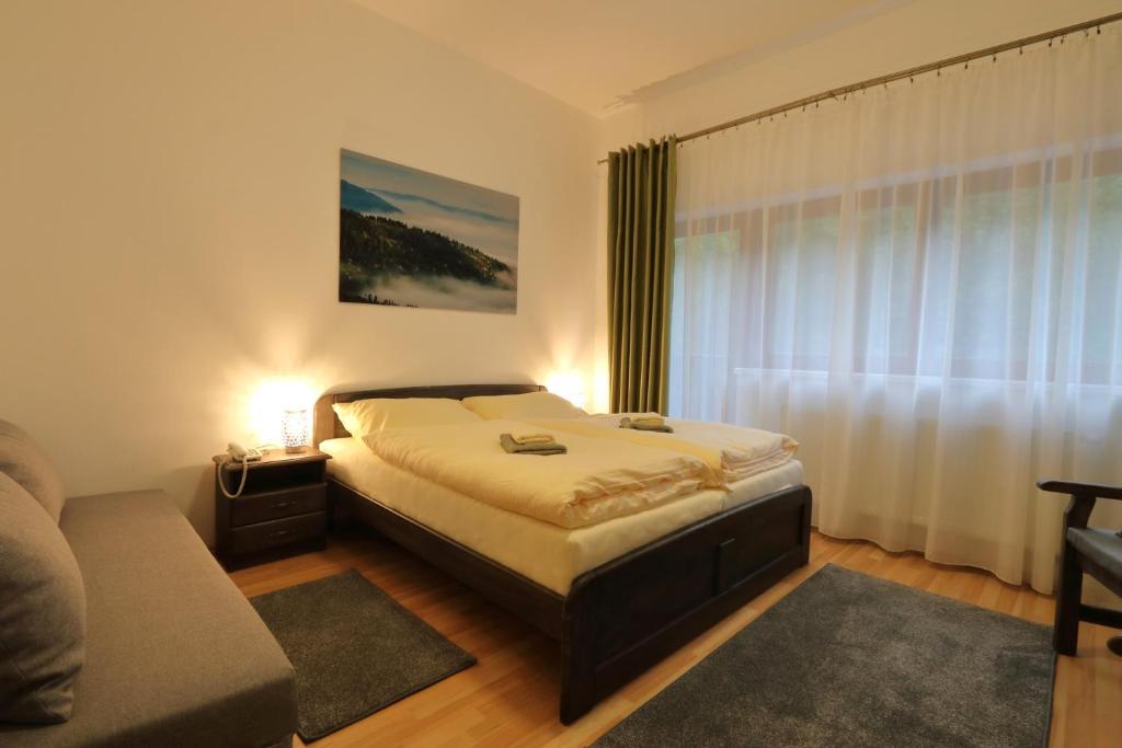 Postel nebo postele na pokoji v ubytování Penzión Solisko*** Oščadnica
