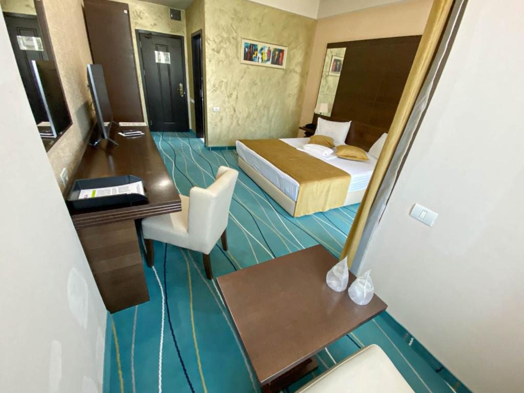 Postel nebo postele na pokoji v ubytování Hotel Nevada