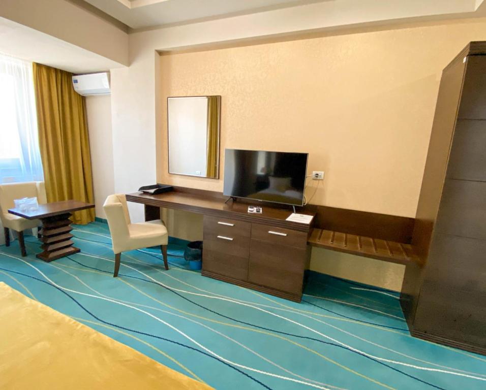 TV a/nebo společenská místnost v ubytování Hotel Nevada
