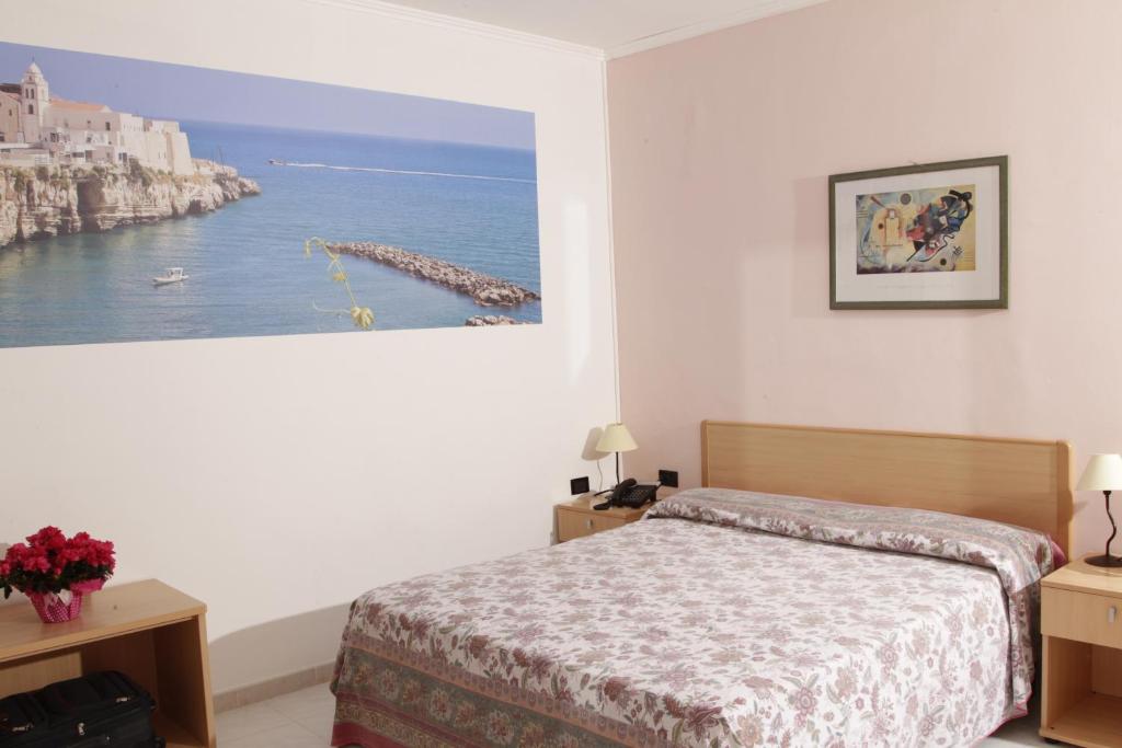 Posteľ alebo postele v izbe v ubytovaní Hotel Club Bellavista