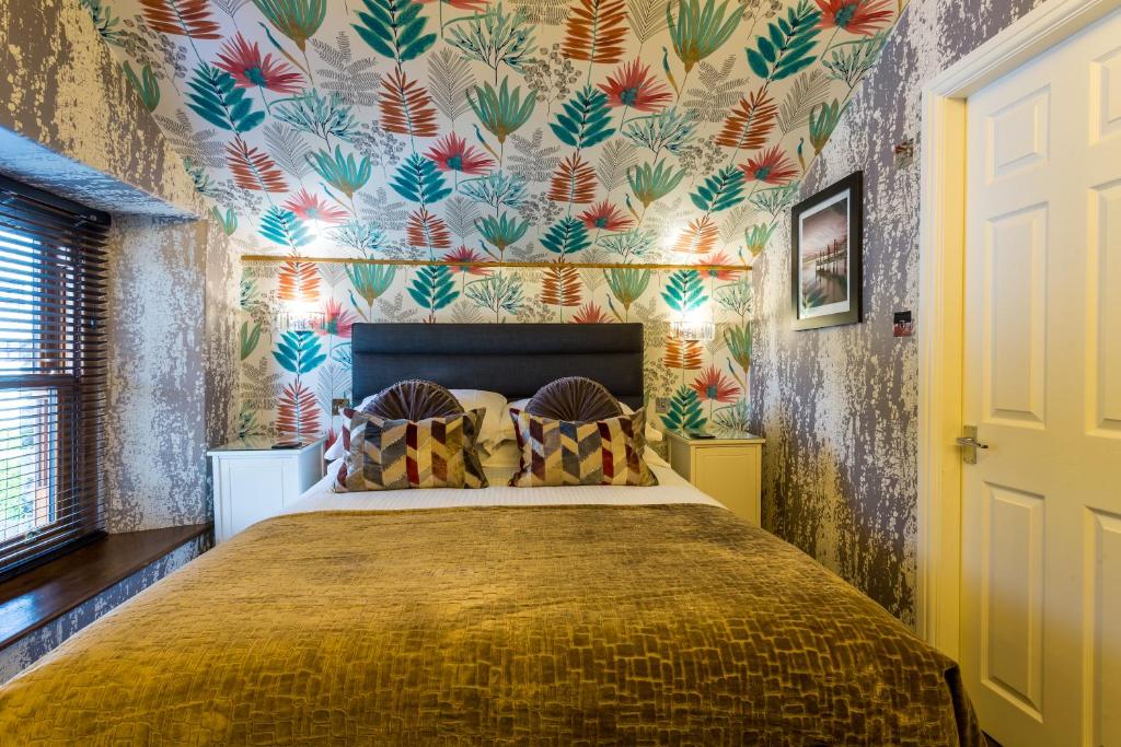 Postel nebo postele na pokoji v ubytování Jerichos Boutique Accommodation