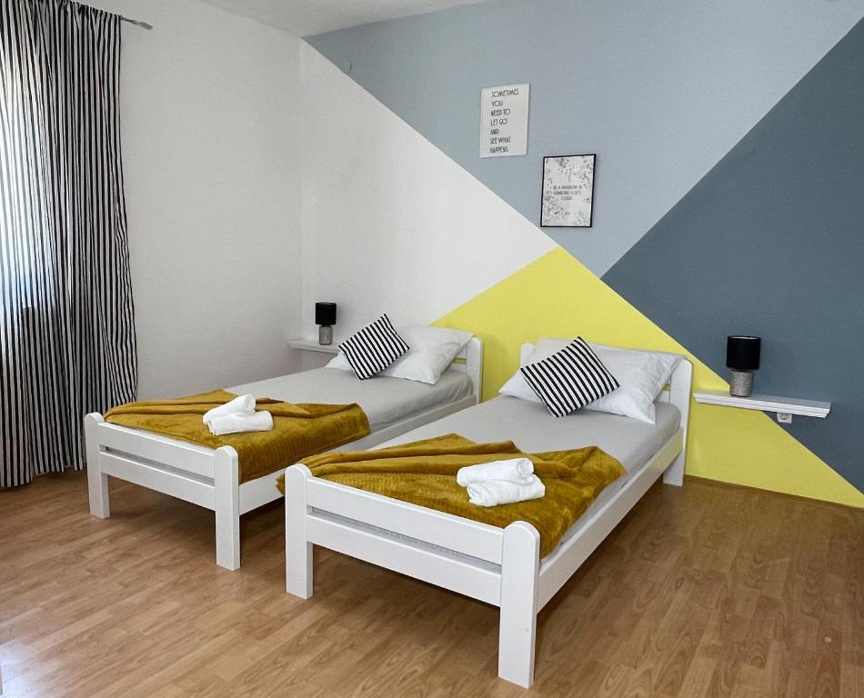 Posteľ alebo postele v izbe v ubytovaní Villa Enjoy